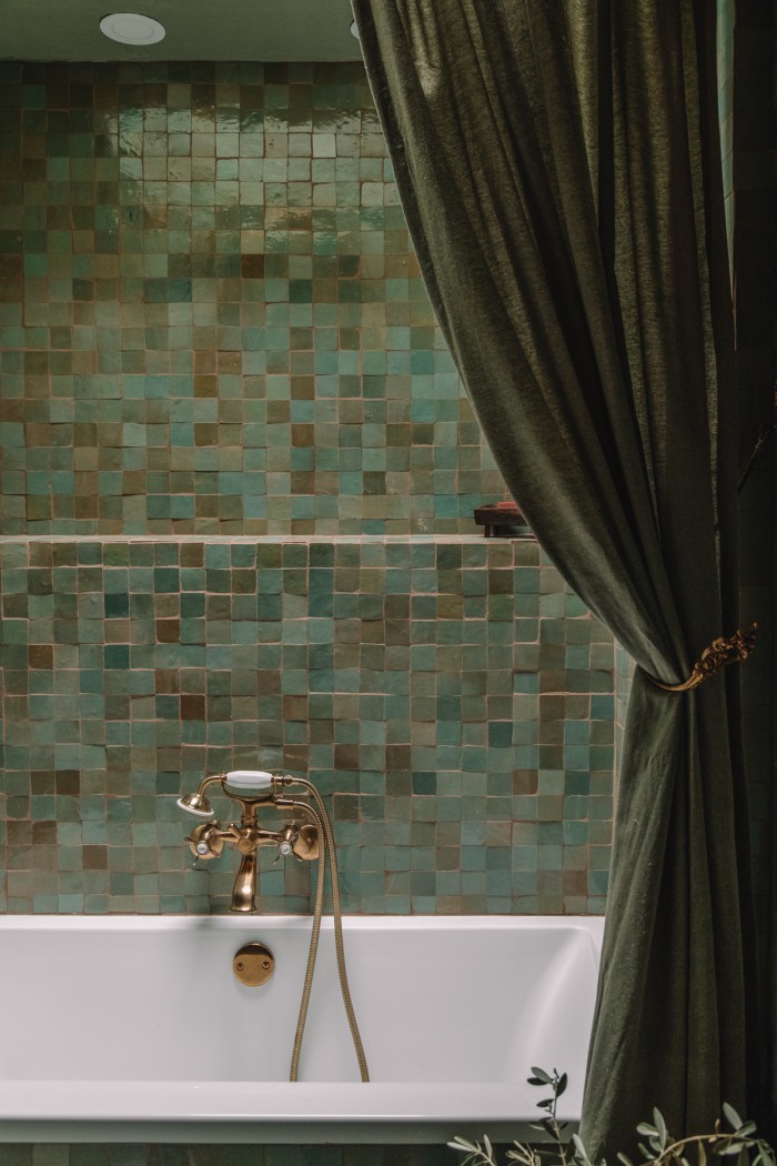sage green tile with shower curtain