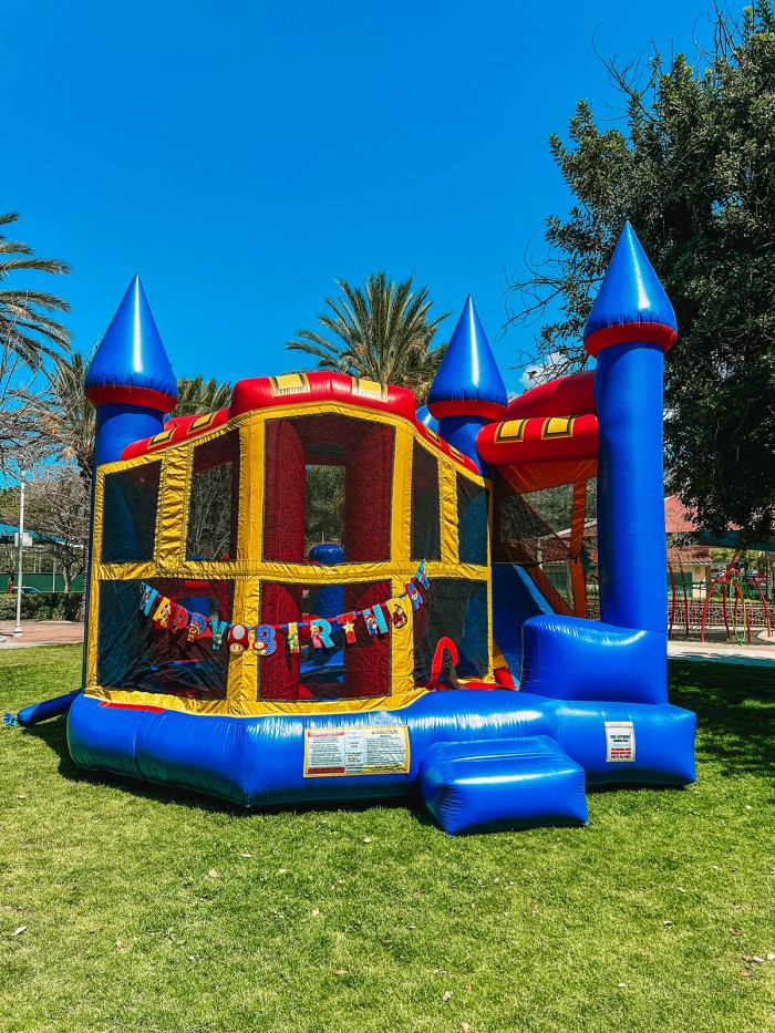 Castle Bounce House with Super Mario Banner
