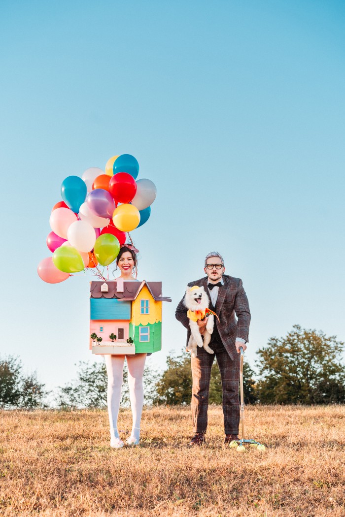 family with dog in Up themed costumes