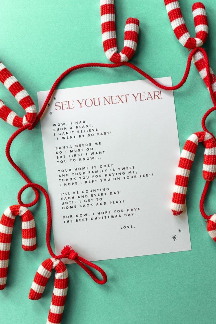 elf goodbye letter on green background with crocheted candy canes around it