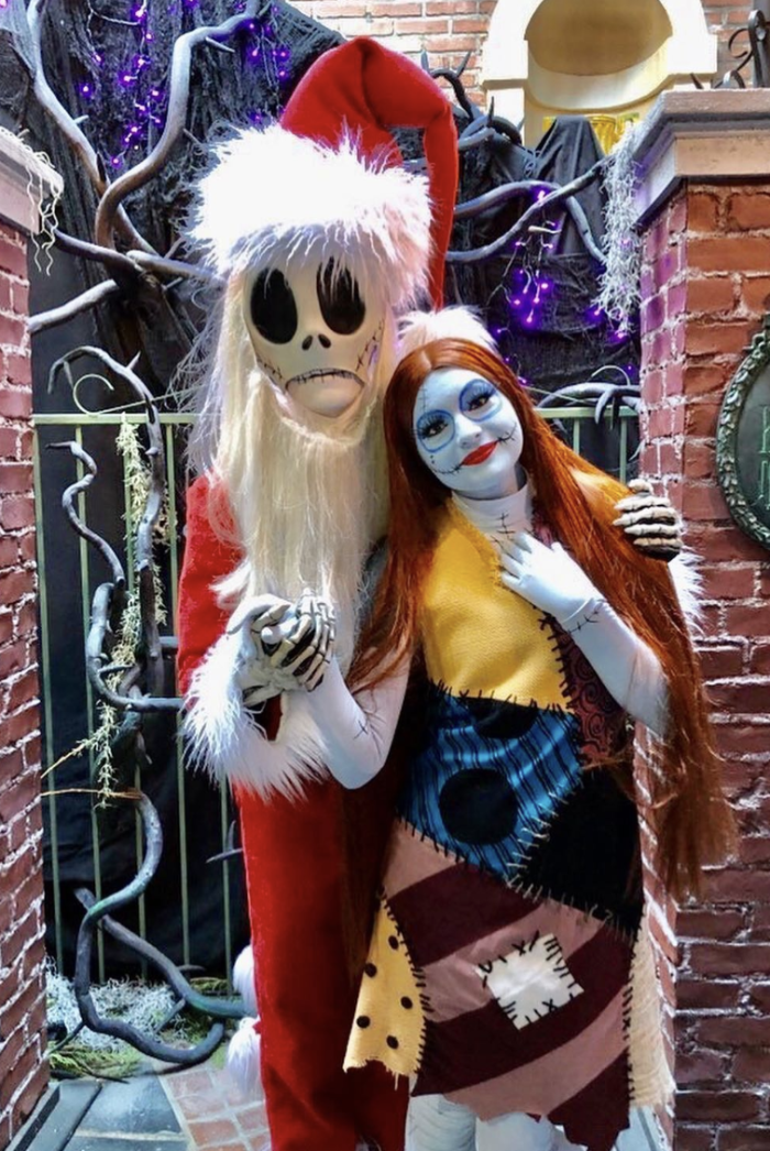 Two people dressed up in Jack and Sally costumes. 