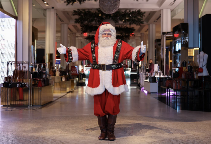 Man dressed as Santa in a shopping mall. 