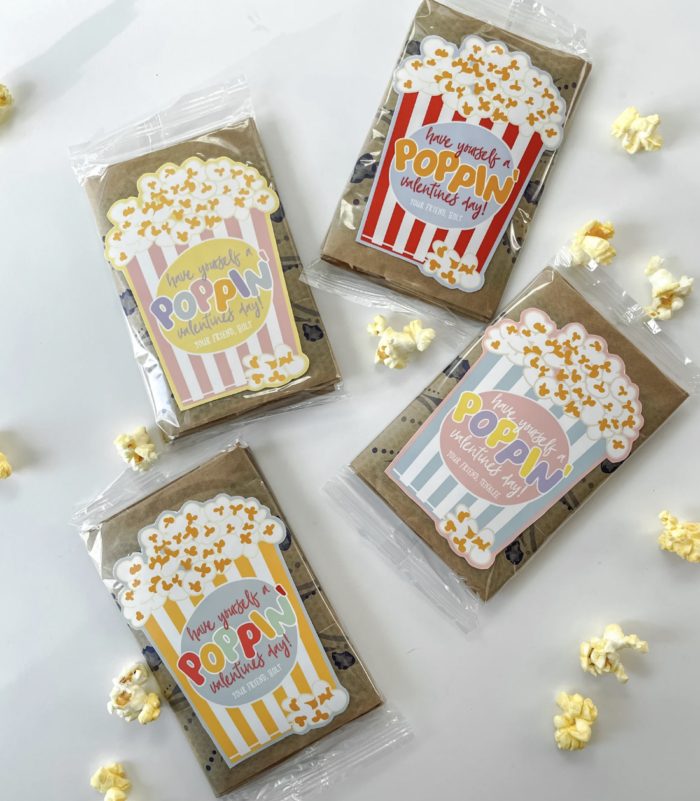Popcorn packages with valentine stickers on them. 