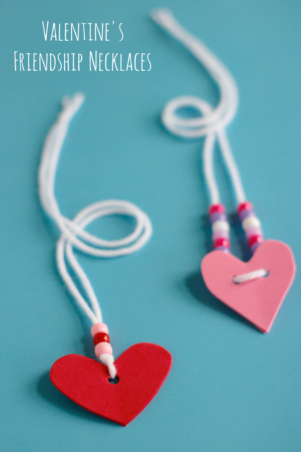 Two homemade friendship necklaces with hearts. 