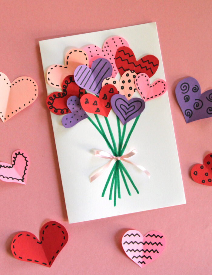 Homemade card with a bouquet of heart-shaped flowers on the front. 