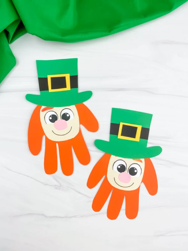 Two leprechaun crafts made from handprints. 