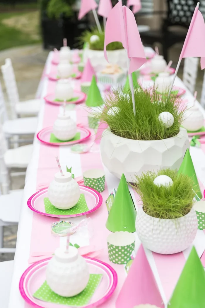Table set with golf-themed items. 