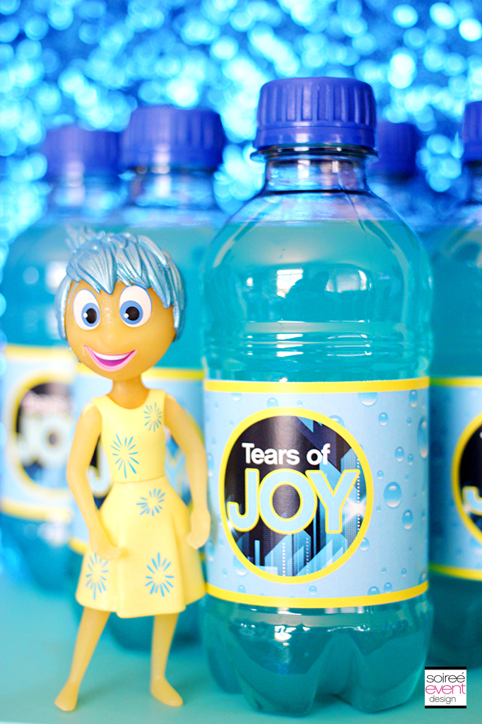 Juice labeled as Tears of Joy next to a figure of Joy from Inside Out. 