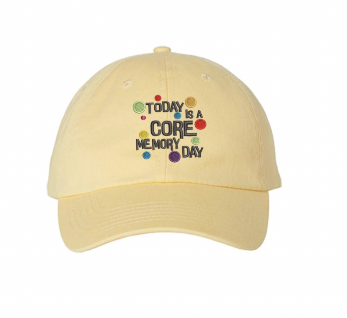 Yellow hat with text "today is a core memory day". 