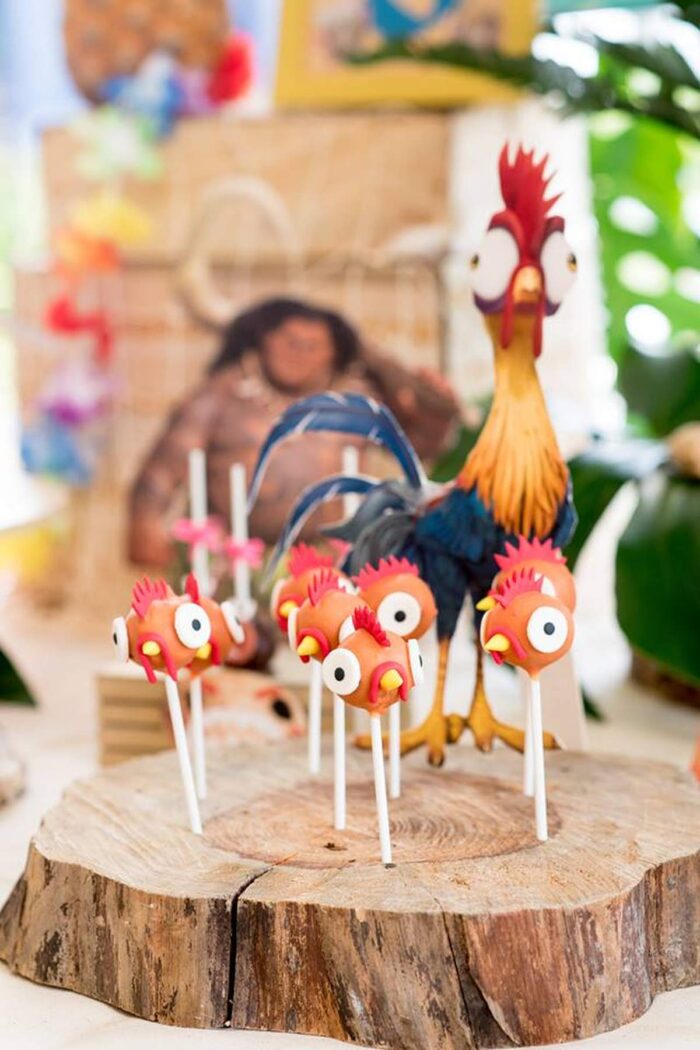 Cake pops in the shape of chicken heads. 