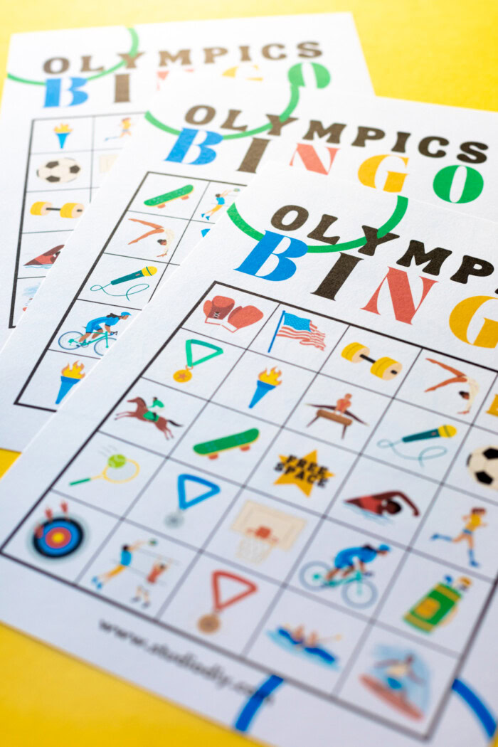 Close up shot of three Olympic bingo cards. 