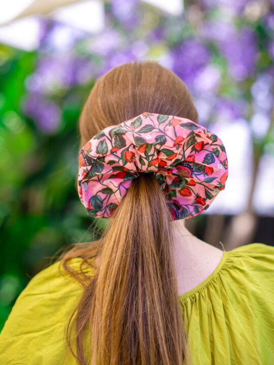 oversized floral scrunchie on ponytail