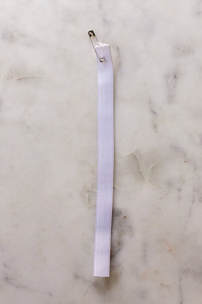 elastic with safety pin on the end