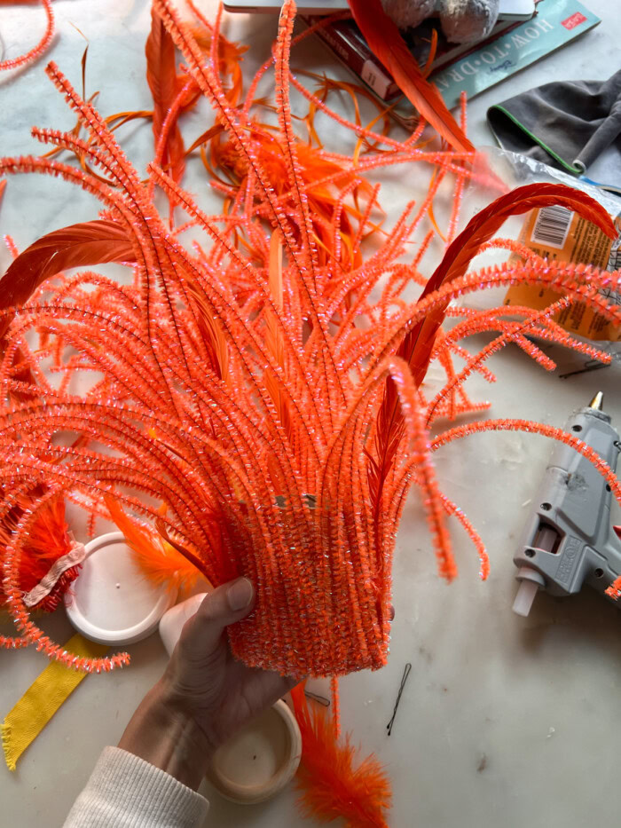 Orange pipe cleaners to make Anxiety hair from Inside Out