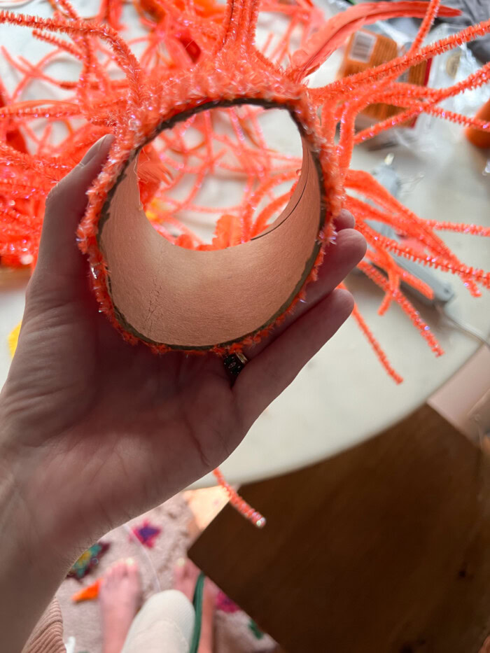 Showing inside of cardboard tube with pipe cleaners