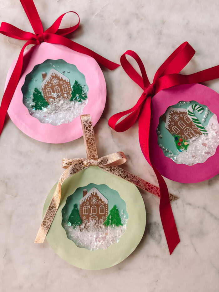 paper plate snow globes on marble