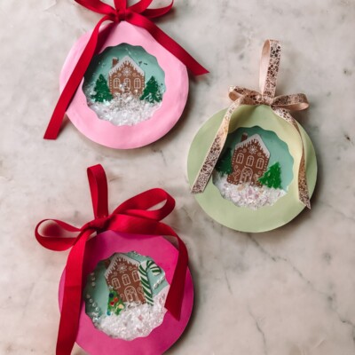 paper plate snow globes on marble