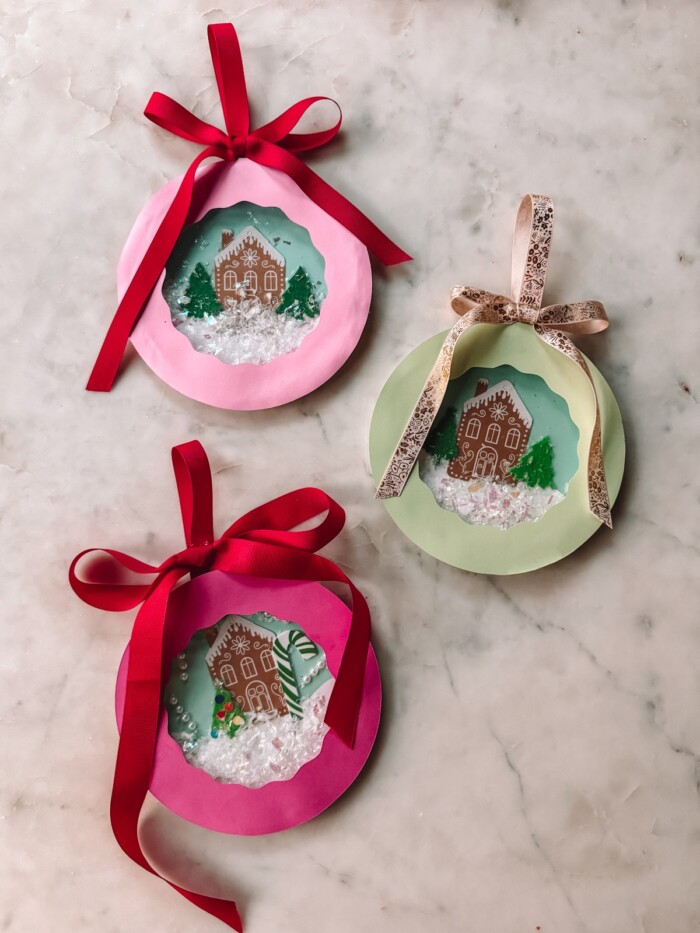 paper plate snow globes on marble