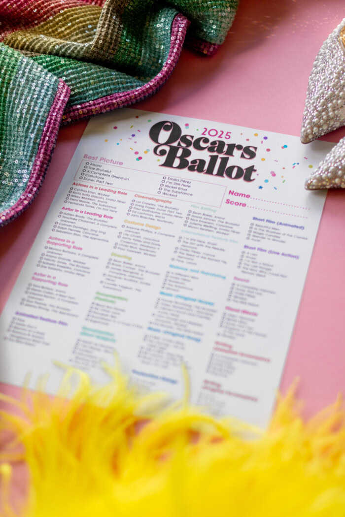 Oscar Ballot with sequins and feathers around it