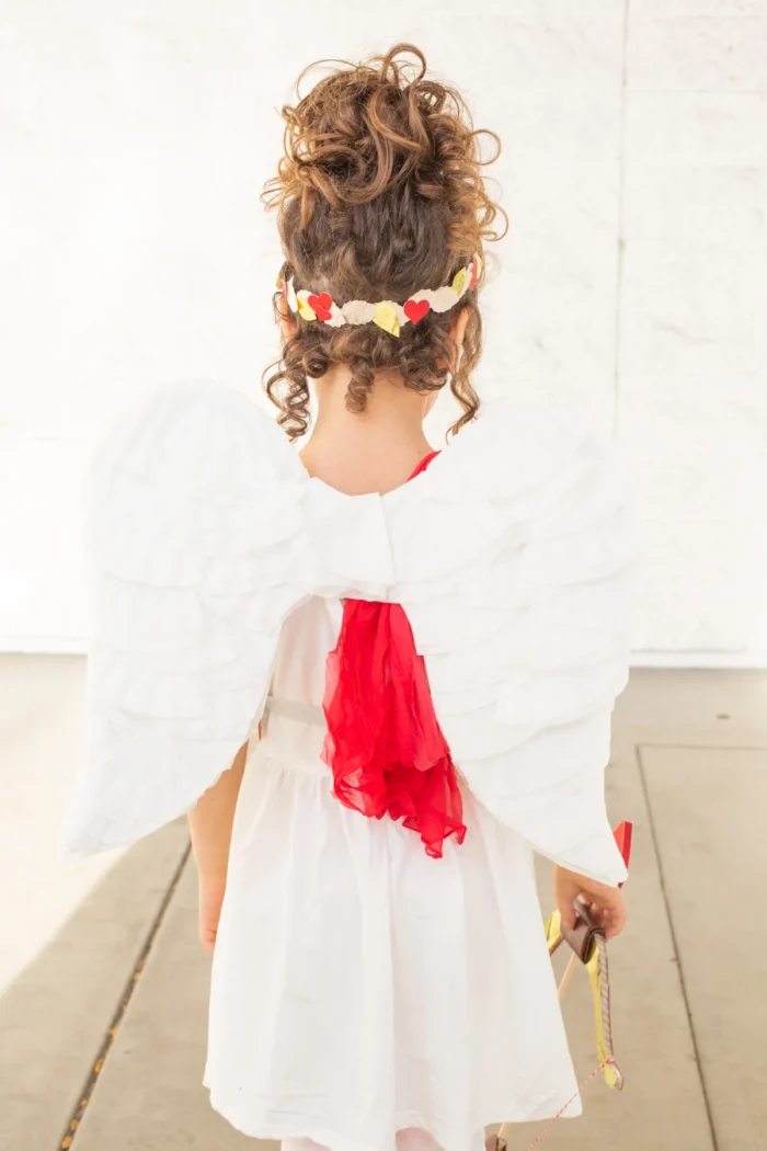 child in cupid costume