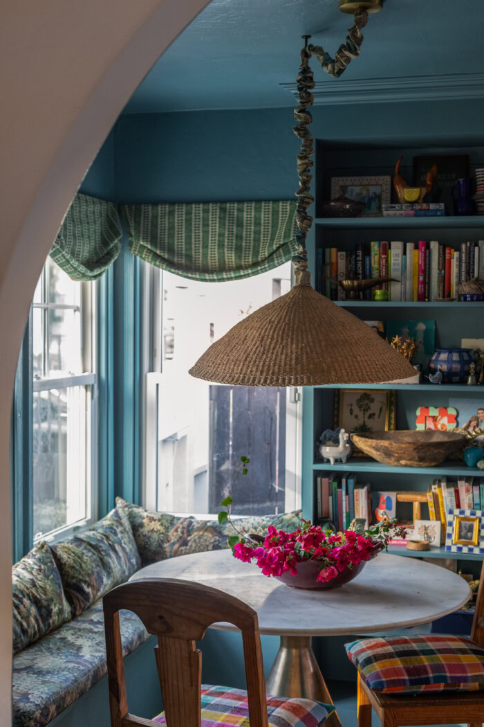 Blue Dining room with rattan pendant lamp