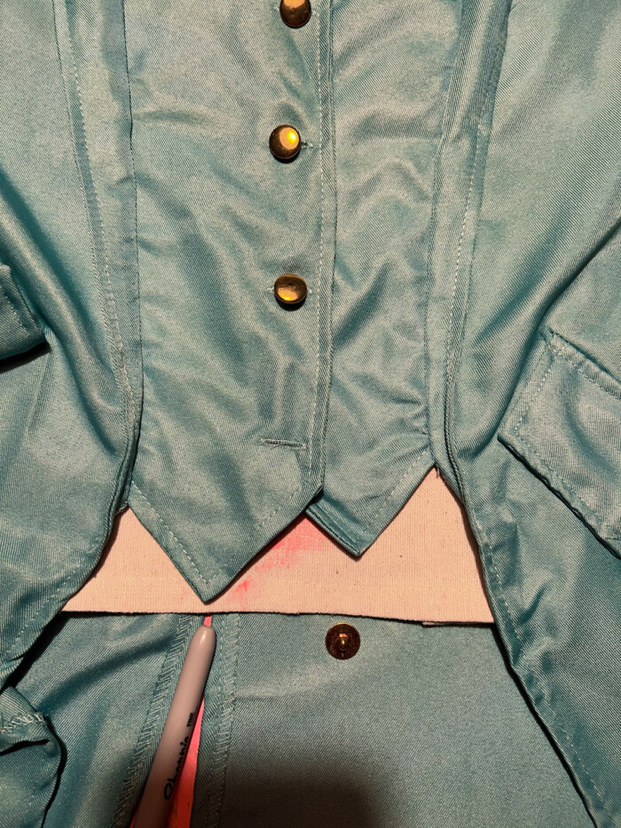 blue suit coat and vest